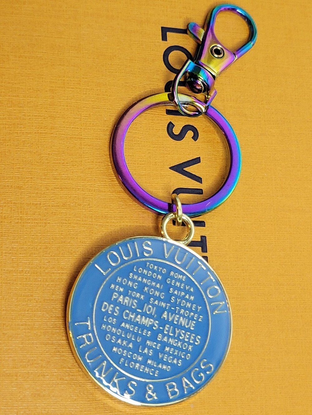 Iridescent Ring 2 Sided Blue Enamel Trunks & Bags Medallion Keychain